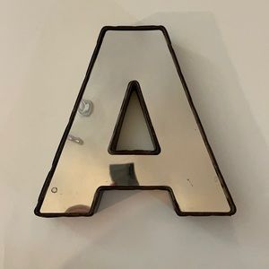 Silver, mirrored letter “A” alphabet decor